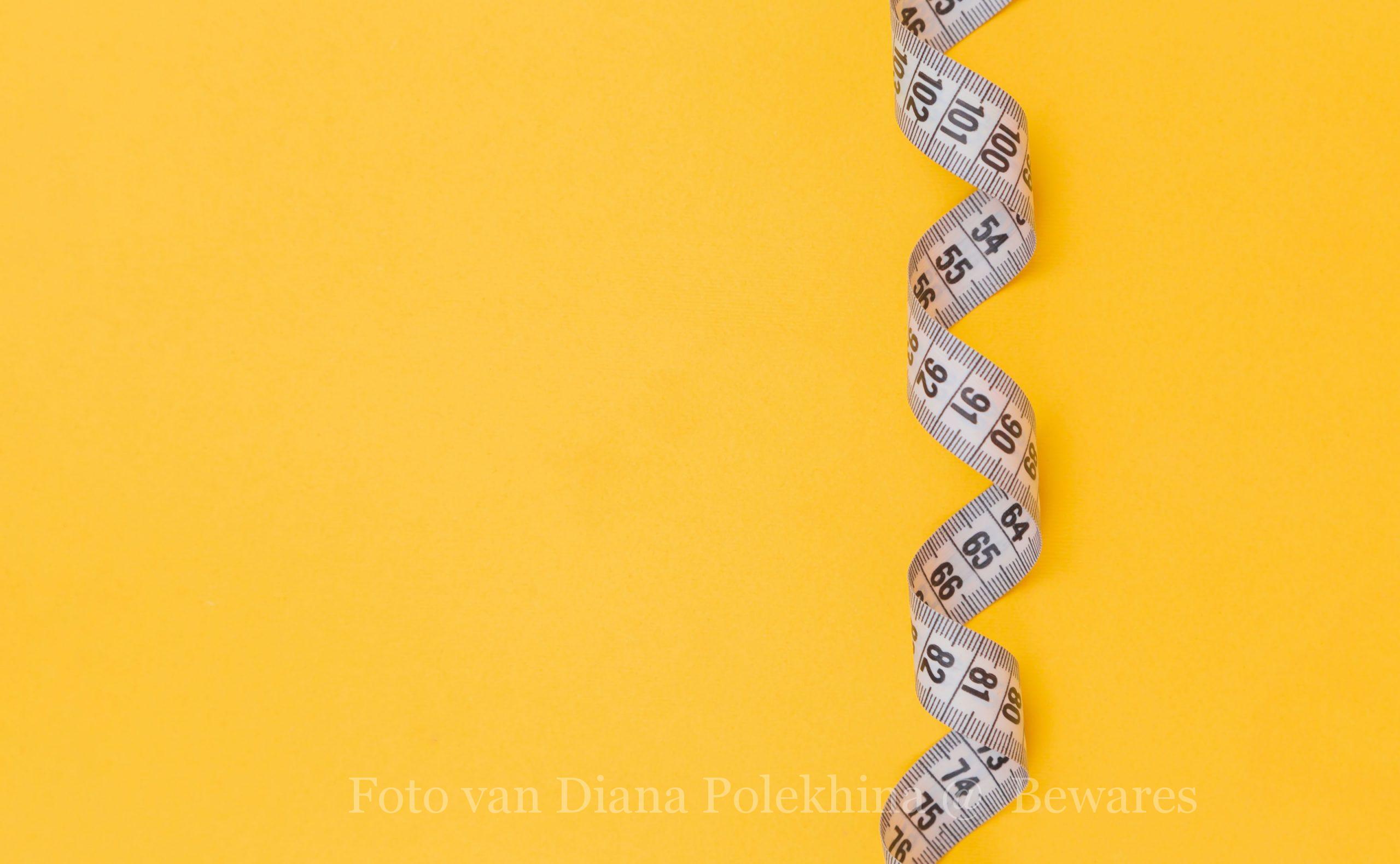 black and white snake on yellow background